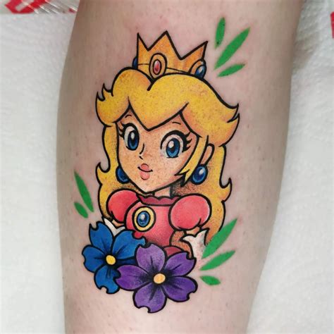 princess peach tattoo|princess peach super mario tattoo.